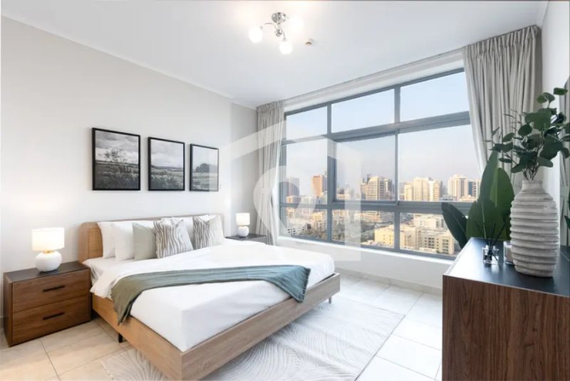 Bright Furnished Apartment with City Views – The Links East Tower
